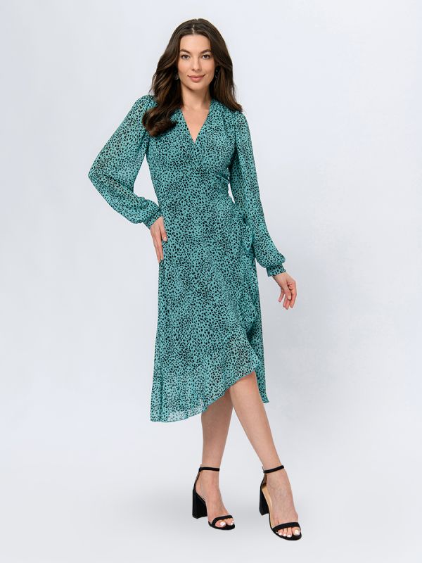 Turquoise colored midi length dress with print