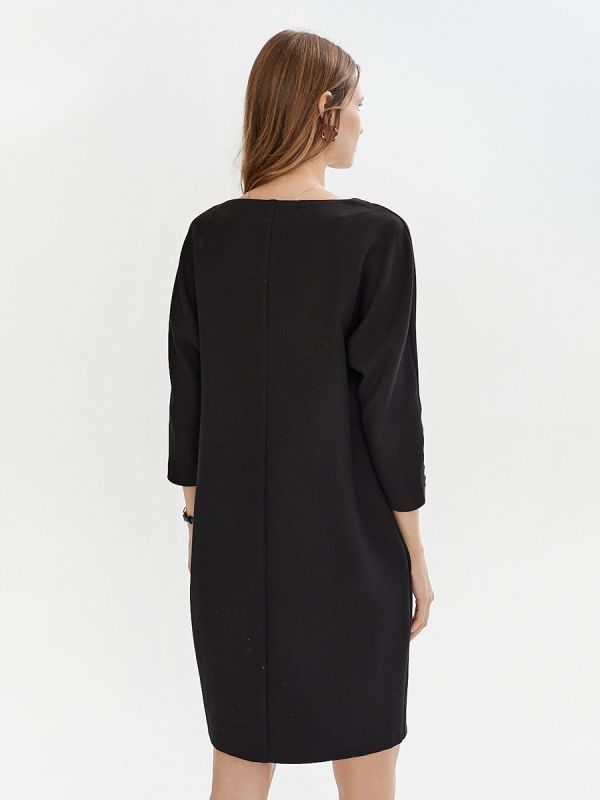 Black mini length dress with slit and pockets