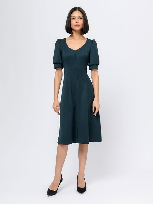 Emerald colored midi length dress with round neckline and short sleeves