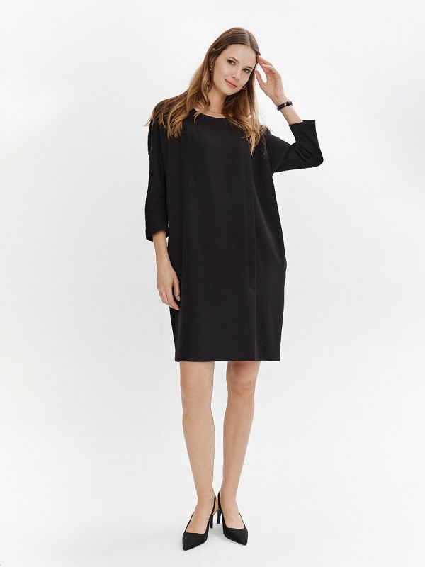 Black mini length dress with slit and pockets