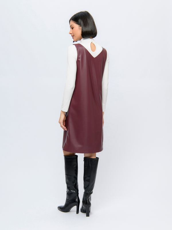 Burgundy-colored faux leather mini length dress with sleeveless free silhouette