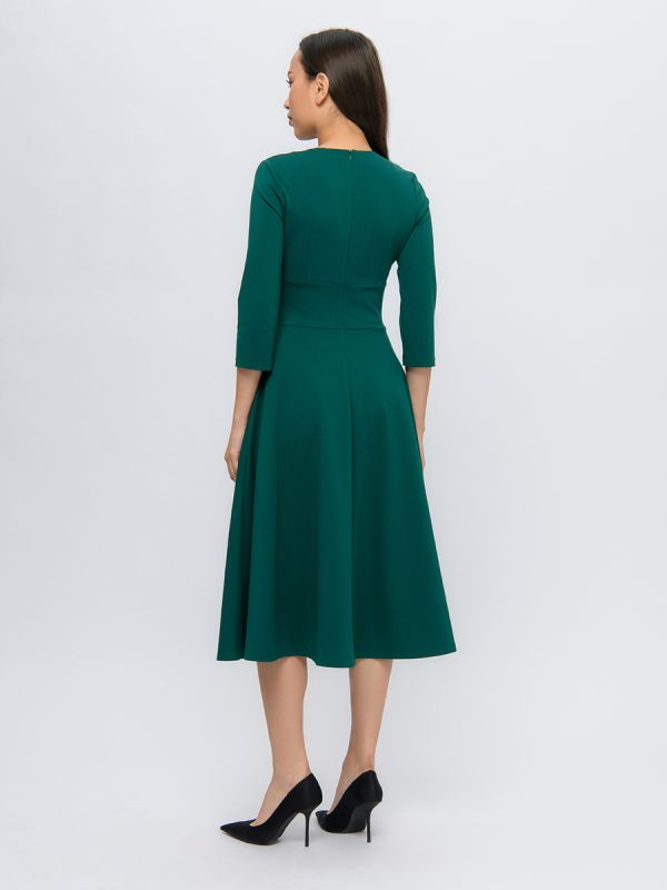 Emerald color midi length dress with deep neckline and 3/4 sleeves