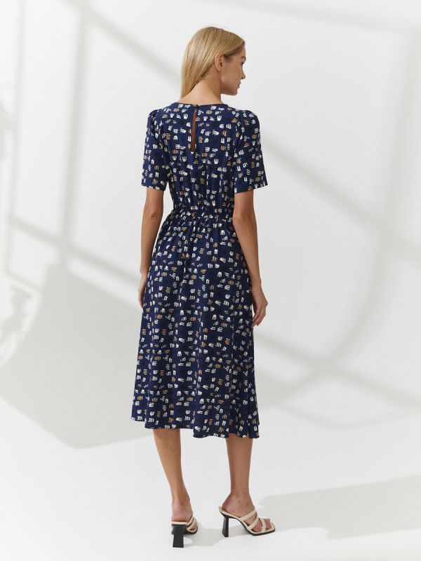 Dark blue midi length print dress with short sleeves