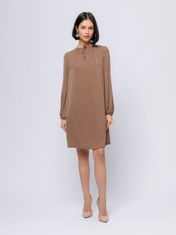 Light brown polka dot mini length dress with a bow