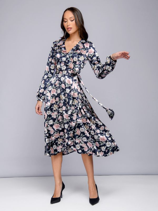 Midi length navy blue print dress with flare and long sleeves