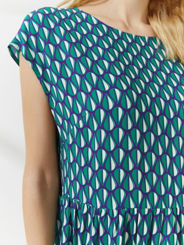 Green print midi length dress with pockets and sleeveless