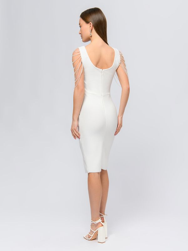 Mini length white bandage dress with decorative embellishment