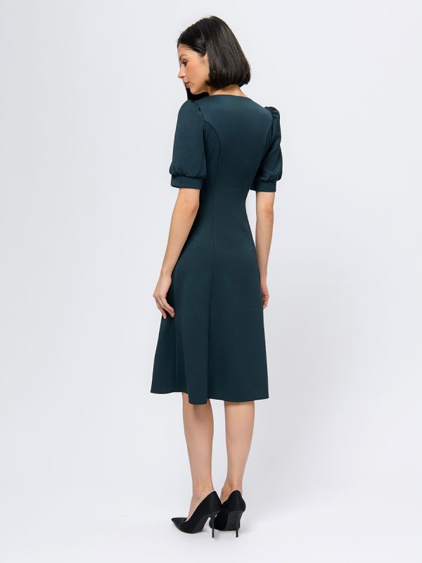 Emerald colored midi length dress with round neckline and short sleeves