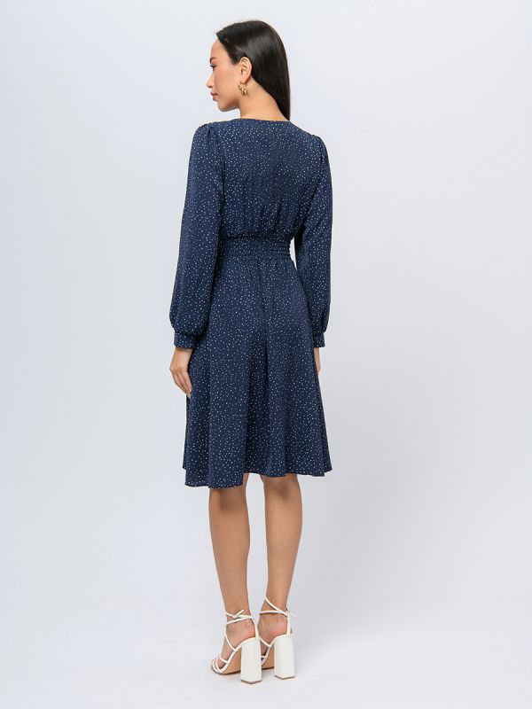 Blue polka dot midi length dress with wide elastic band at the waist