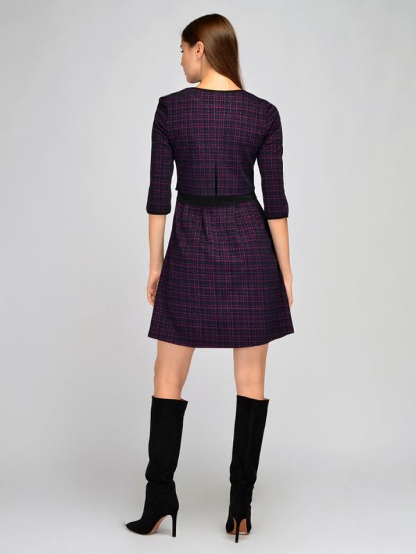 Mini length black plaid dress with contrast inserts