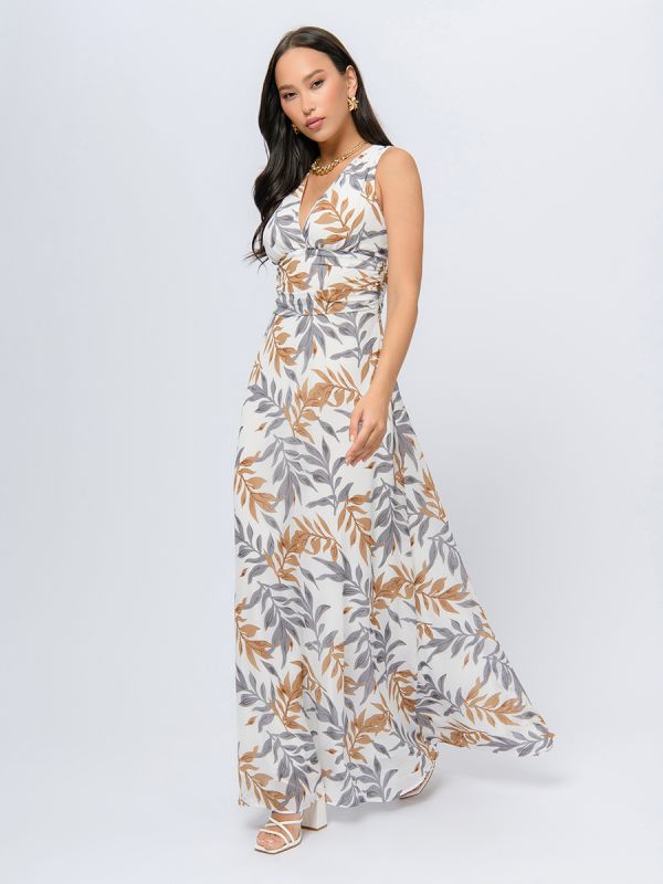 Milk colored maxi length dress with floral print and deep neckline