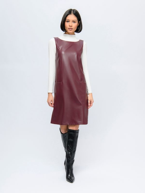 Burgundy-colored faux leather mini length dress with sleeveless free silhouette