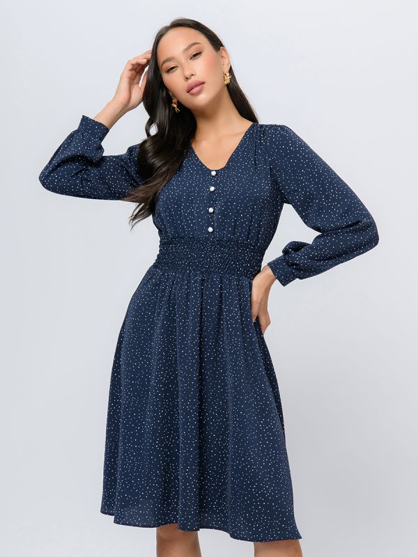 Blue polka dot midi length dress with wide elastic band at the waist