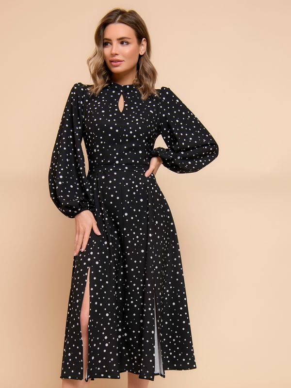 Black polka dot midi dress with voluminous sleeves and slit