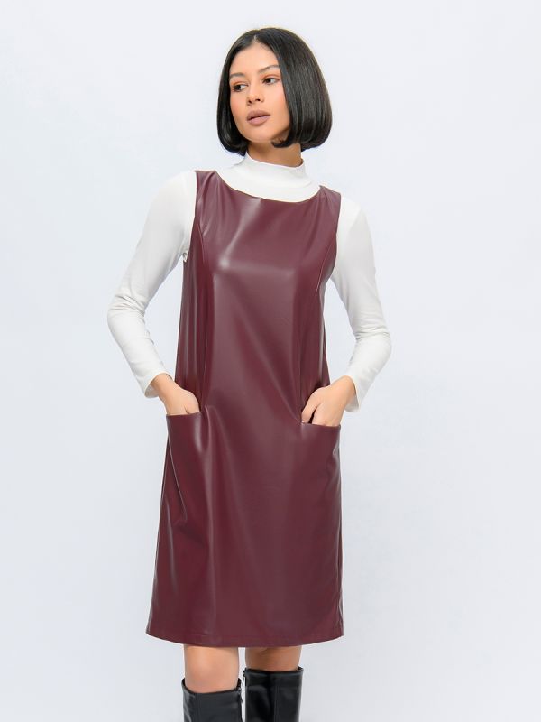 Burgundy-colored faux leather mini length dress with sleeveless free silhouette