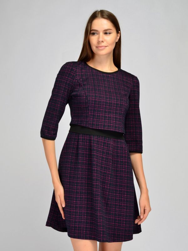 Mini length black plaid dress with contrast inserts